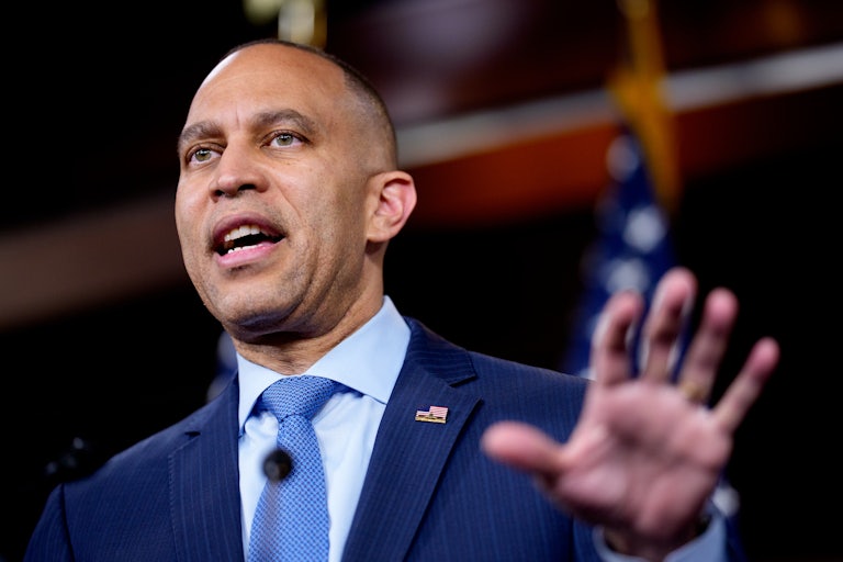House Minority Leader Hakeem Jeffries speaks while making a hand gesture for emphasis.