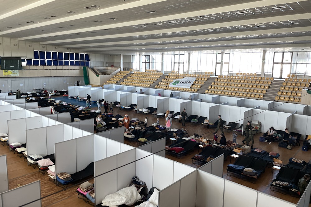 A slower day at a reception point for refugees, located in a community sports center in Chełm, Poland, near the Ukrainian border.