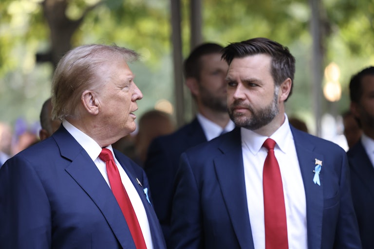 Donald Trump and J.D. Vance look at each other