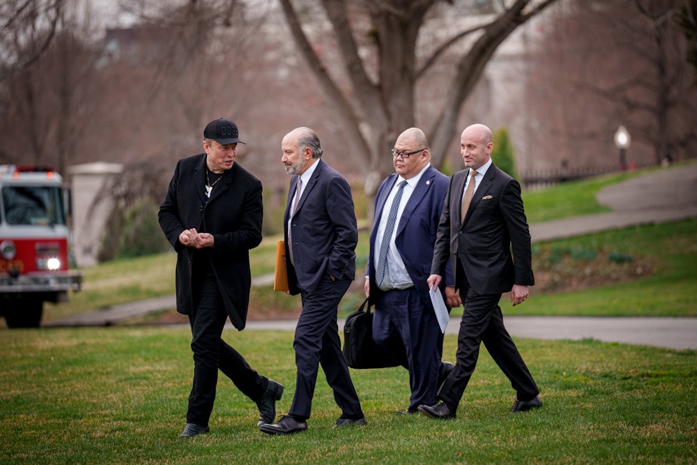 Musk walks and talks with Lutnick, Cheung, and Miller.