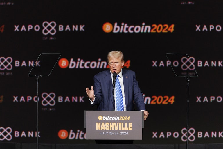 Donald Trump gestures while speaking at a Bitcoin conference