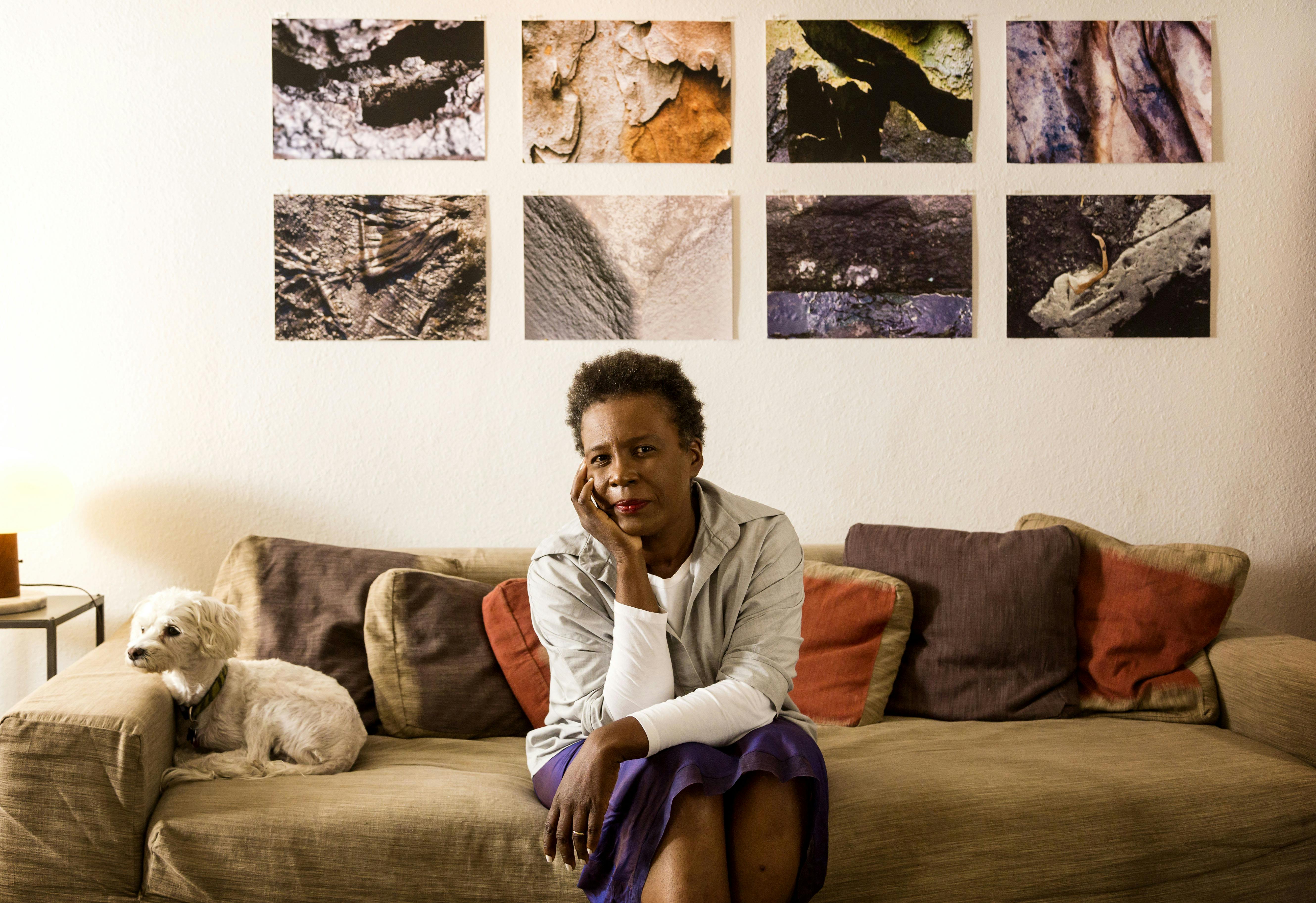 Poet Claudia Rankine and her dog at her home in September 2014.