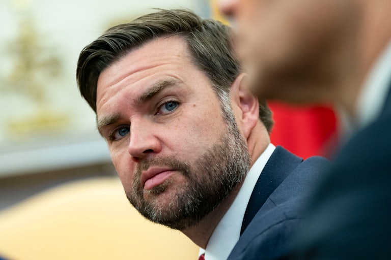 JD Vance sits in the Oval Office during Donald Trump's meeting with Emmanuel Macron