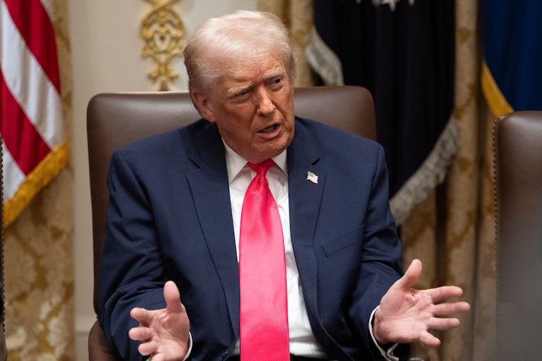 Donald Trump speaks during a meeting in the Oval Office.