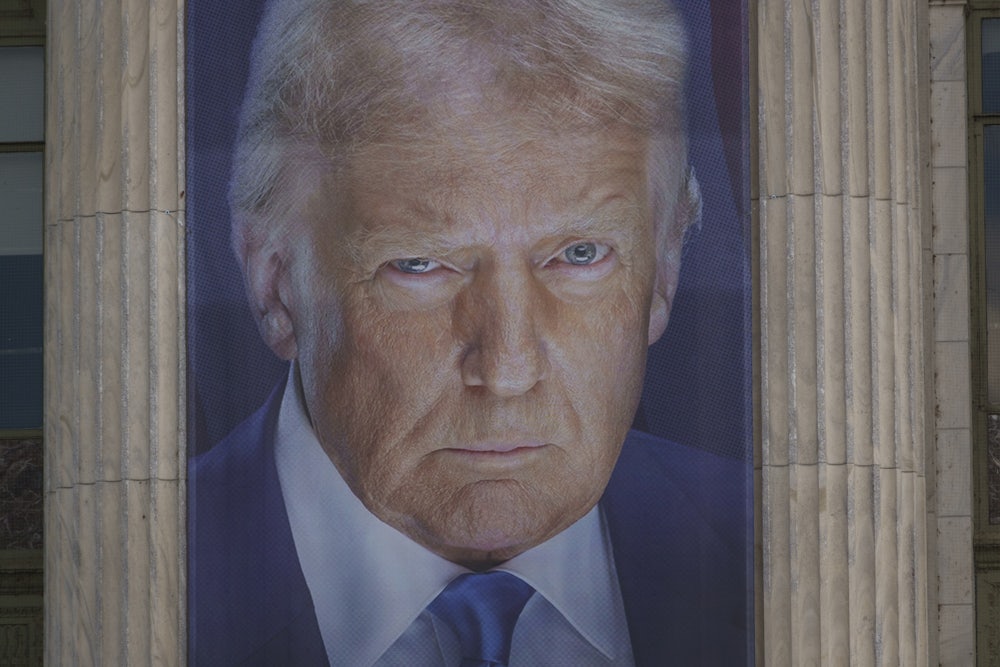 A banner depicting Donald Trump hung outside of the U.S. Department of Agriculture building in Washington, D.C., in late May.