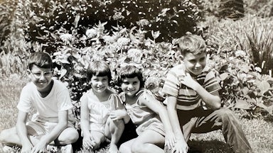 The author Lawrence Ingrassia (right) with his siblings Paul, Angela and Gina in August 1960 in Middletown, New York.