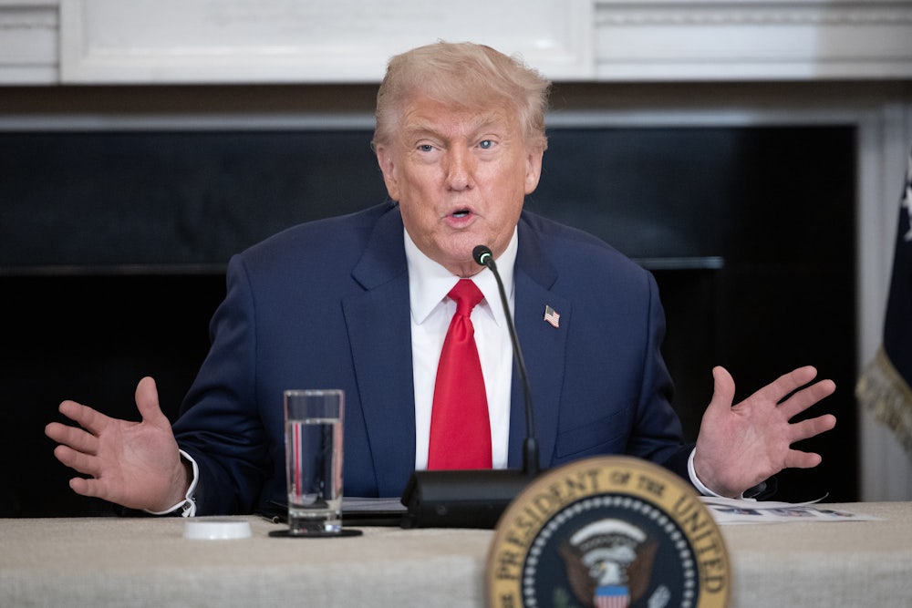 Donald Trump speaks during an "Invest America Roundtable" meeting on June 9, 2025 inside the State Dining Room at the White House.