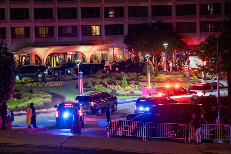 Law enforcement surrounds the Washington Hilton Hotel after shots were fired at the White House Correspondents' Dinner
