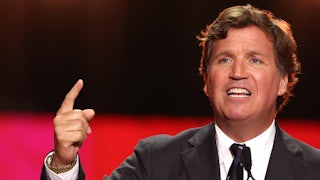 Tucker Carlson speaks during the public memorial service for right-wing activist Charlie Kirk