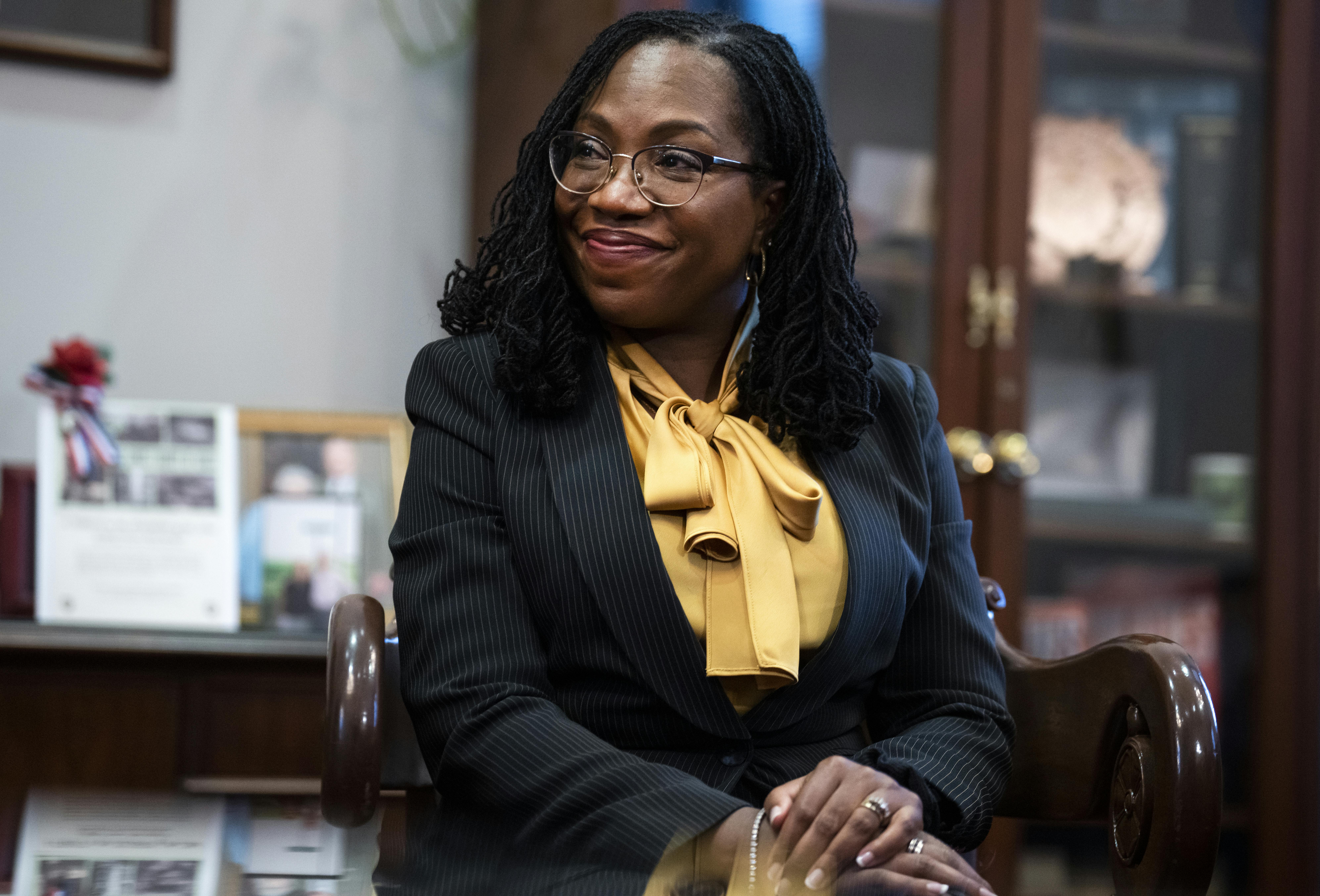 Judge Ketanji Brown Jackson sits in the office of Senator Charles Grassley.