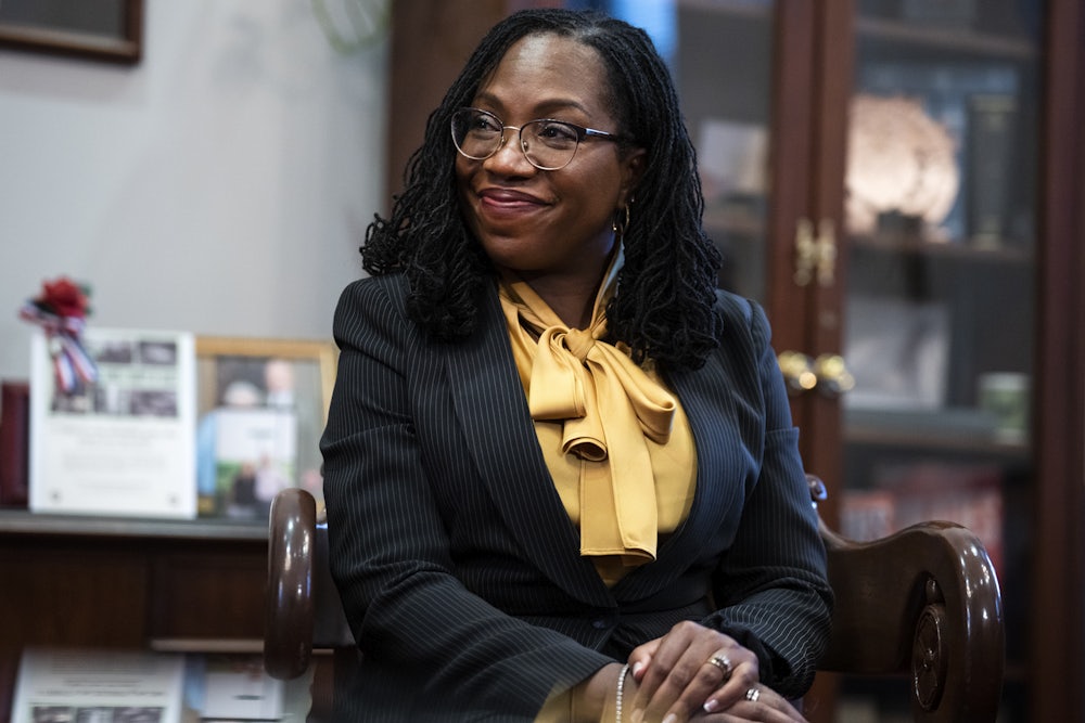 Judge Ketanji Brown Jackson sits in the office of Senator Charles Grassley.