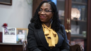 Judge Ketanji Brown Jackson sits in the office of Senator Charles Grassley.