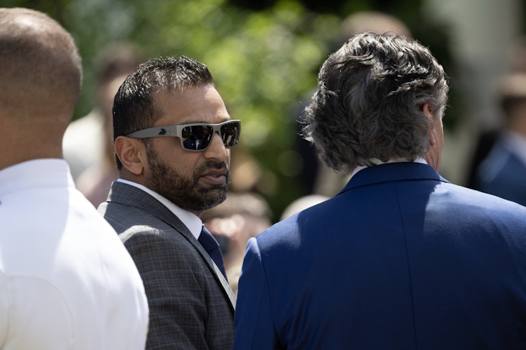 FBI Director Kash Patel stands in the White House Rose Garden