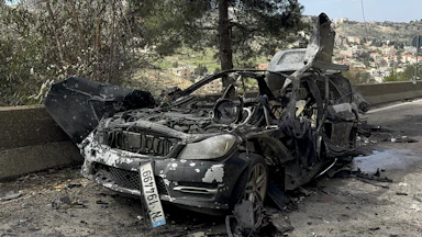 A car that was destroyed by an Israeli strike in Lebanon. Three journalists were killed in the attack.