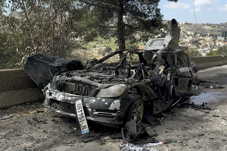 A car that was destroyed by an Israeli strike in Lebanon. Three journalists were killed in the attack.