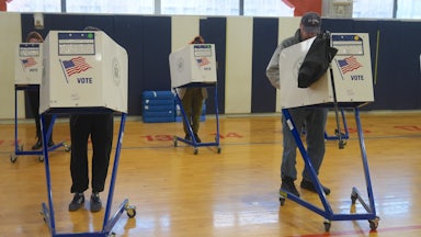 Voters cast their ballots at the polls.