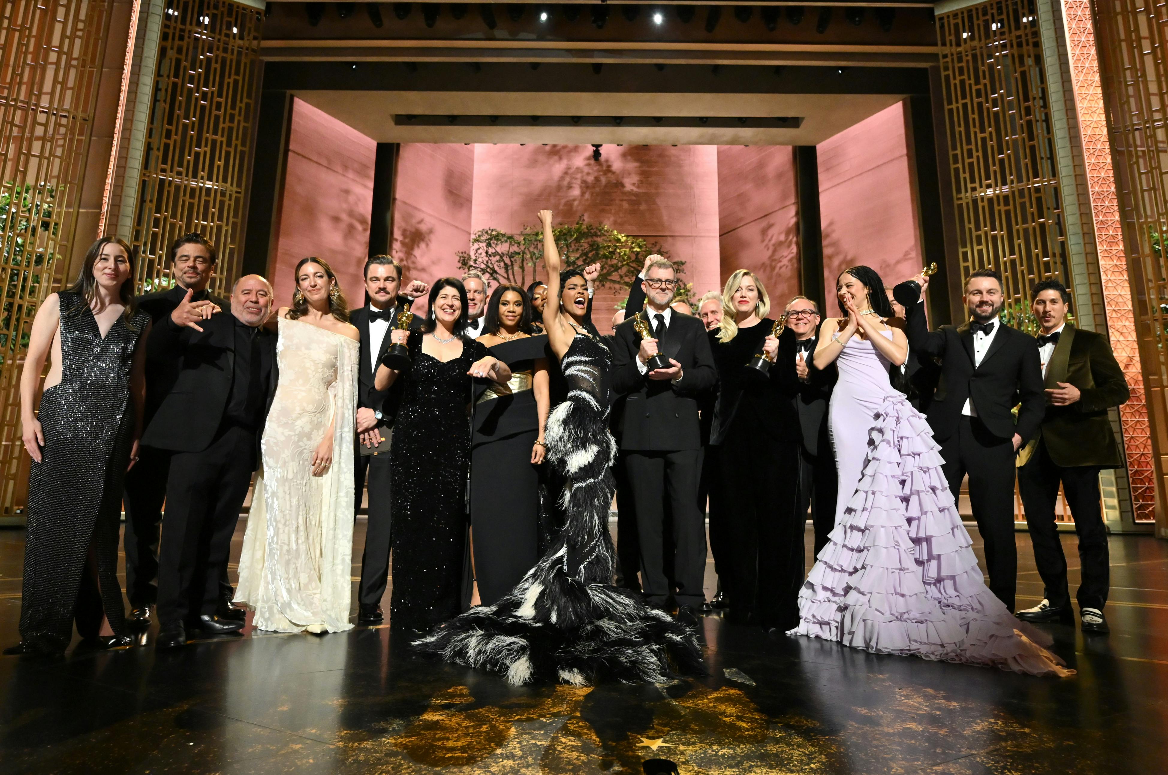 The cast and crew of Best Picture winner “One Battle After Another” pose backstage at the 98th Oscars, on March 15, 2026