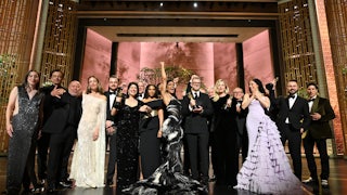 The cast and crew of Best Picture winner “One Battle After Another” pose backstage at the 98th Oscars, on March 15, 2026