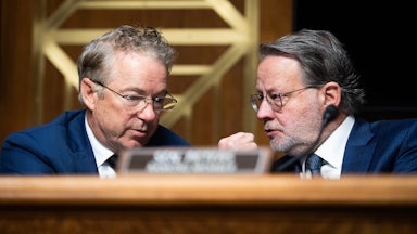 Senators Rand Paul and Gary Peters speak during a Senate hearing