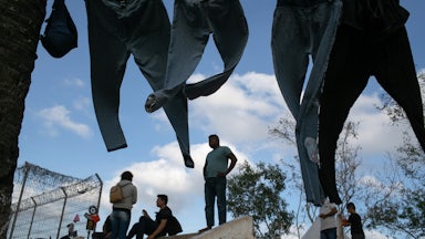 Clothes dry at a camp for asylum seekers in Matamoros, Mexico