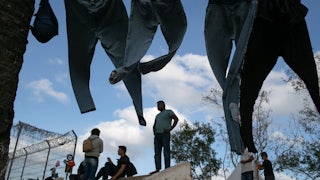 Clothes dry at a camp for asylum seekers in Matamoros, Mexico