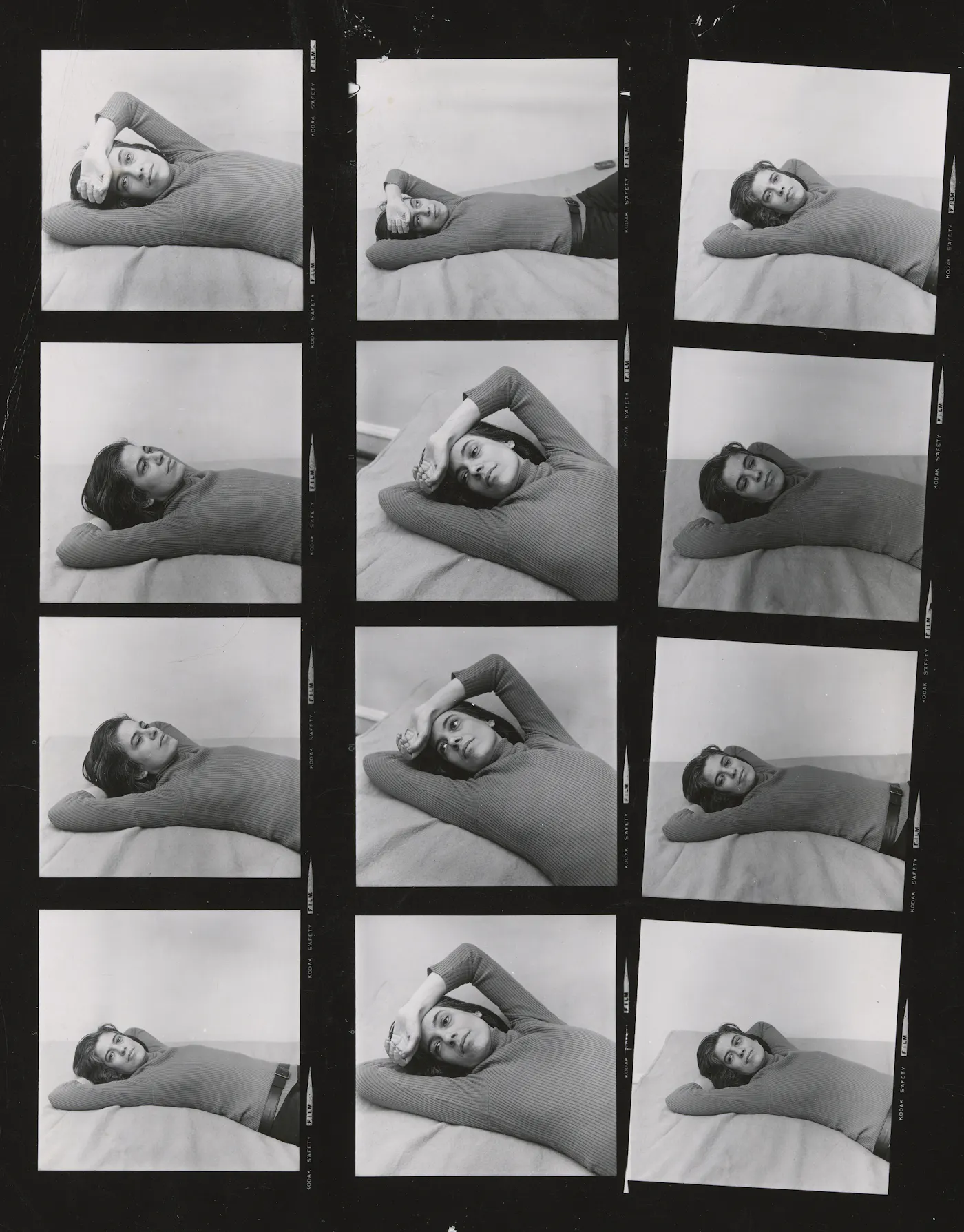 A contact sheet of Susan Sontag who was photographed by Peter Hujar in her apartment in New York City in 1975.