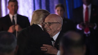 Trump and Rupert Murdoch embrace at a ceremony in New York