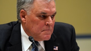 IRS Commissioner Charles Rettig grimaces during testimony before the House Oversight Committee.
