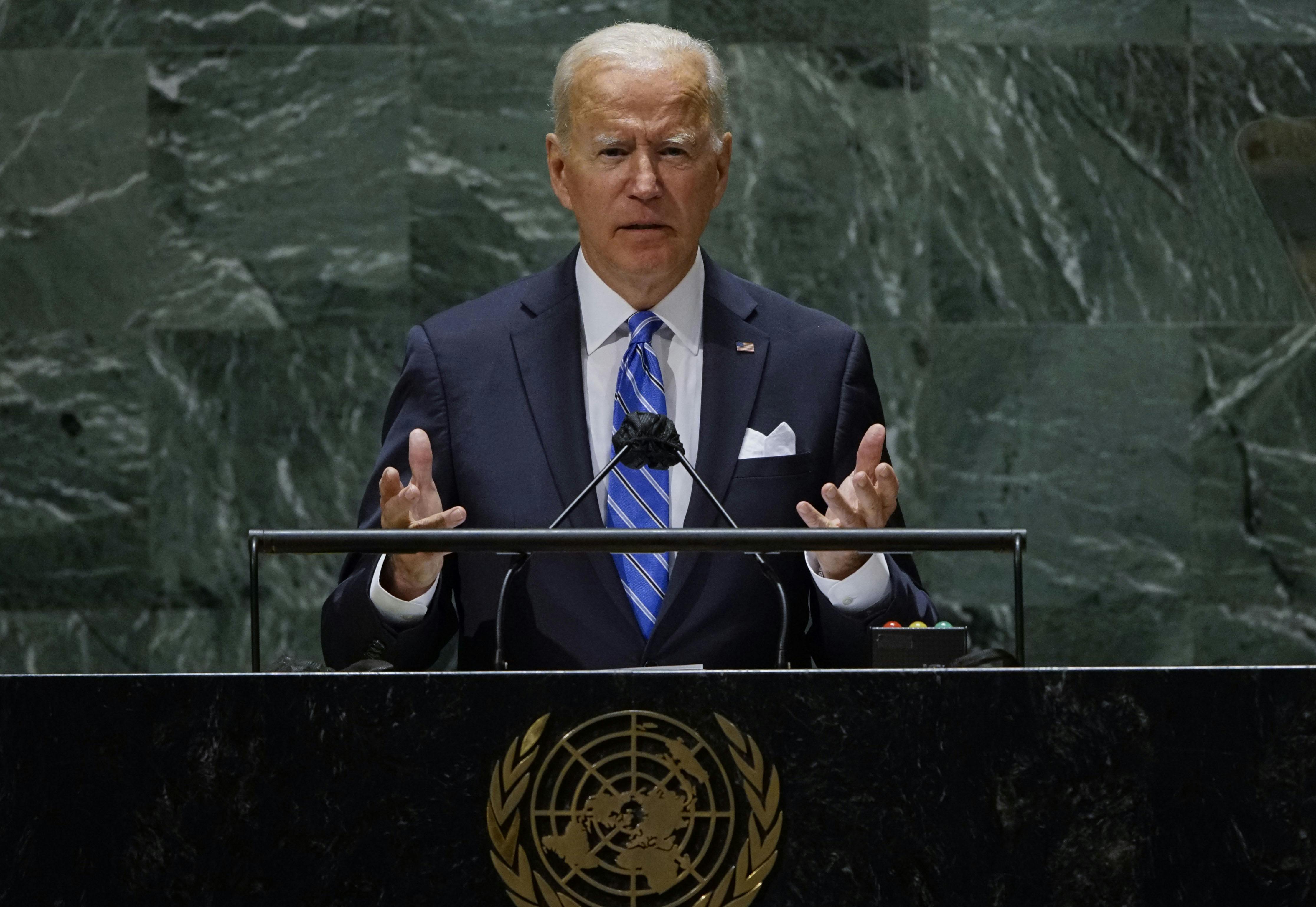 President Joe Biden gestures as he speaks before the United Nations.