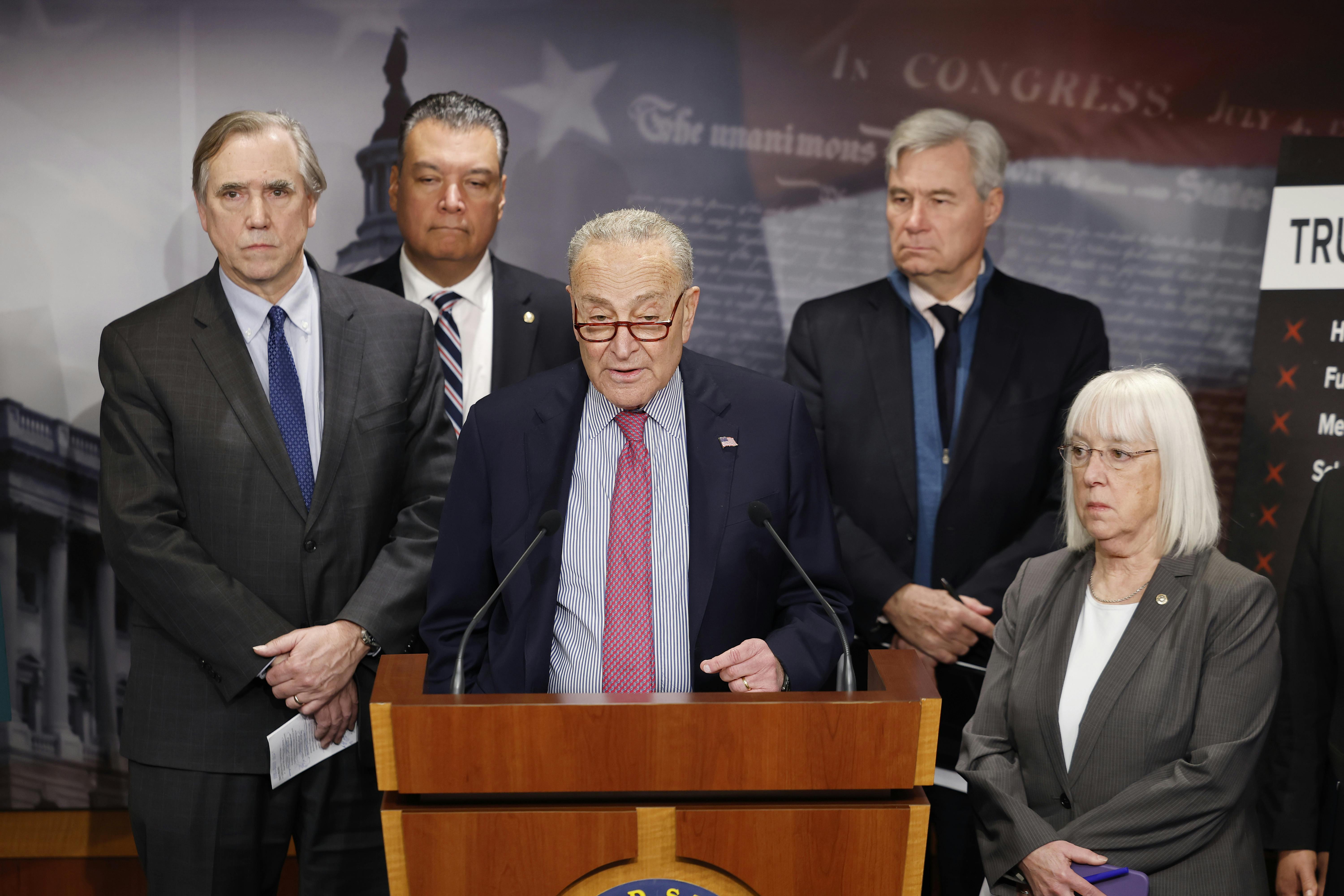 Senate Minority Leader Chuck Schumer speaks alongside Democratic members of the Senate Budget Committee at the U.S. Capitol in Washington, DC. 