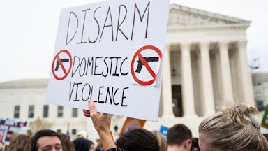 Activists rally outside the Supreme Court before the start of oral arguments in the United States v. Rahimi