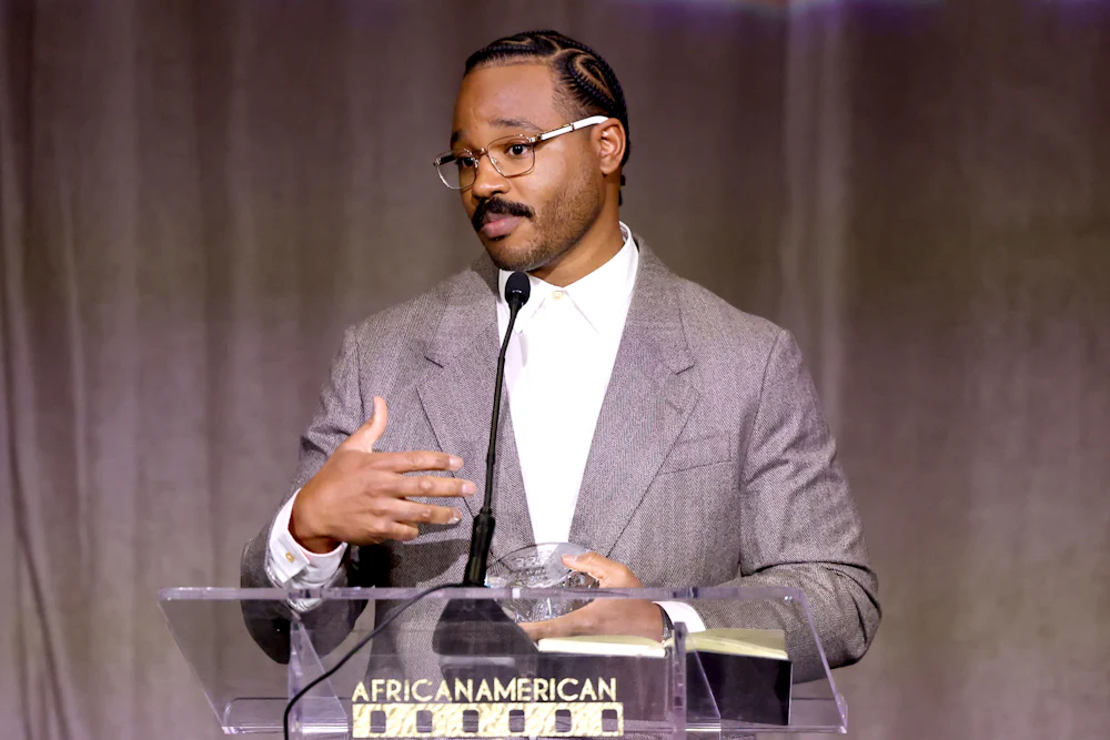 Ryan Coogler accepting an award in Los Angeles
