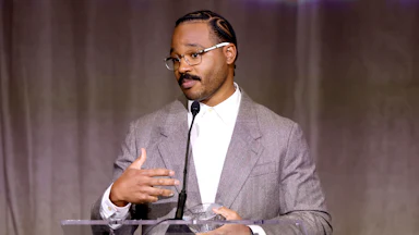 Director Ryan Coogler accepting an award in Los Angeles