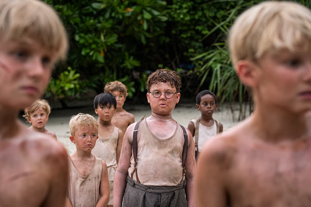An episodic image from the TV show "Lord of The Flies" starring Noah Flemyng as Sam, Cassius Flemyng as Eric, and David McKenna as Piggy"
