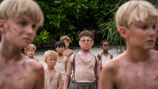 An episodic image from the TV show "Lord of The Flies" starring Noah Flemyng as Sam, Cassius Flemyng as Eric, and David McKenna as Piggy"
