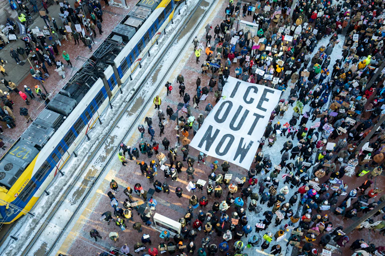 In an aerial view, demonstrators gather to march for an end to ICE operations in Minneapolis.