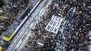 In an aerial view, demonstrators gather to march for an end to ICE operations in Minneapolis.