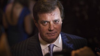 Paul Manafort speaks with the press during an election night event in 2016.