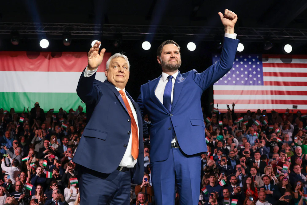 JD Vance and Viktor Orban on a rally stage in Budapest