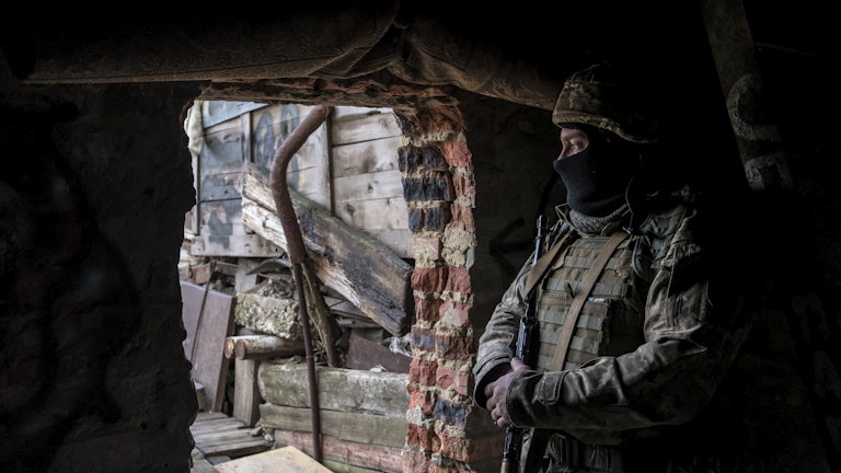 a Ukrainian soldier in a front-line position
