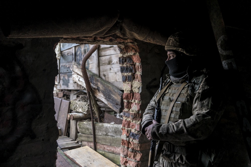 a Ukrainian soldier in a front-line position