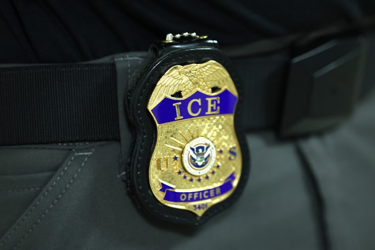 ICE badge hanging off a belt