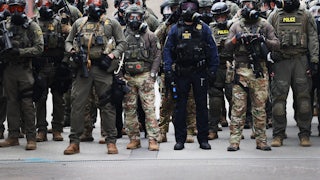Federal agents clash with protesters outside a downtown U.S. Immigration and Customs Enforcement (ICE) facility in Portland, Oregon.