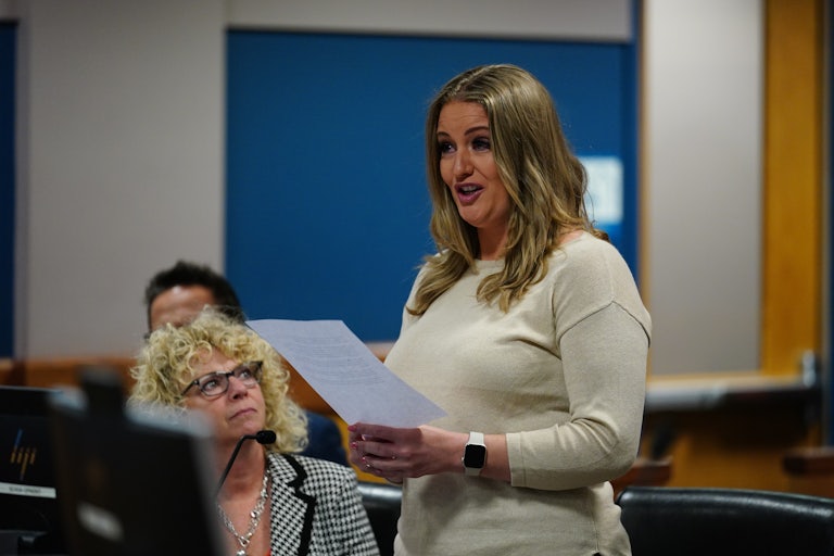 Jenna Ellis stands in court and reads off a piece of paper