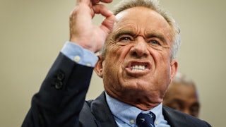 Robert F. Kennedy Jr. holds up his arm and gnashes his teeth. He's very angry