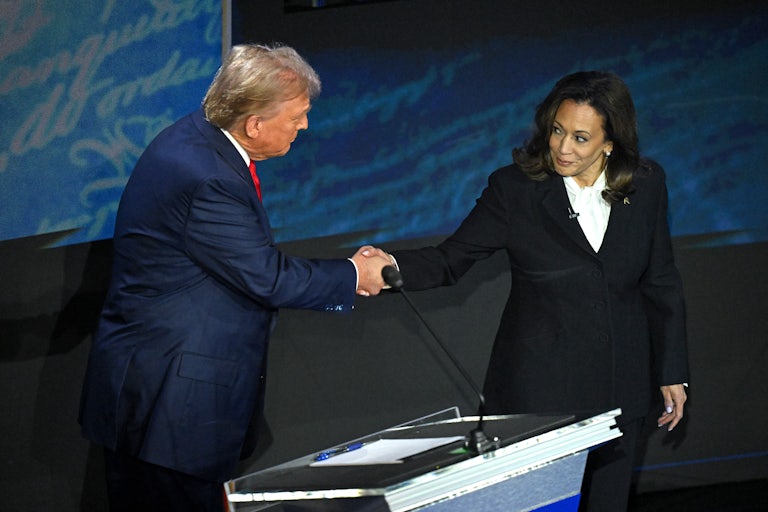 Donald Trump and Kamala Harris shake hands on the debate stage