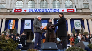 New York City Mayor Zohran Mamdani stands next to his wife Rama Duwaji as Vermont Senator Bernie Sanders swears him in
