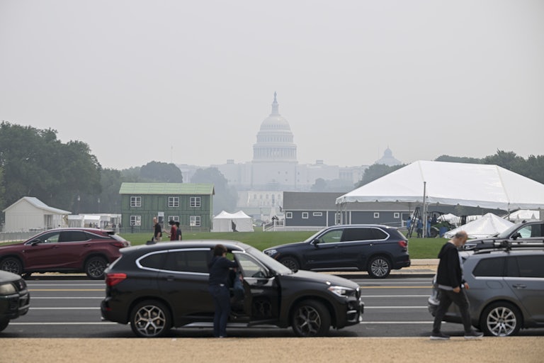 Smoke clouds a view of the U.S. Capitol in Washington, D.C.