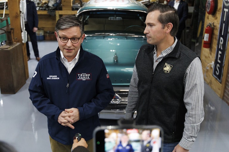 House Speaker Mike Johnson speaks while Tennessee Representative-elect Matt Van Epps looks on.