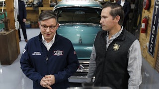 House Speaker Mike Johnson speaks while Tennessee Representative-elect Matt Van Epps looks on.
